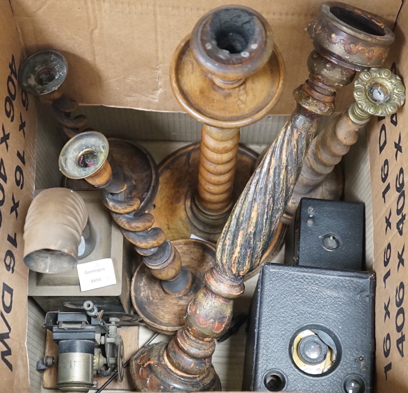 A group of five various wooden candlesticks, two vintage Kodak box cameras and magic lantern slide projector (8)